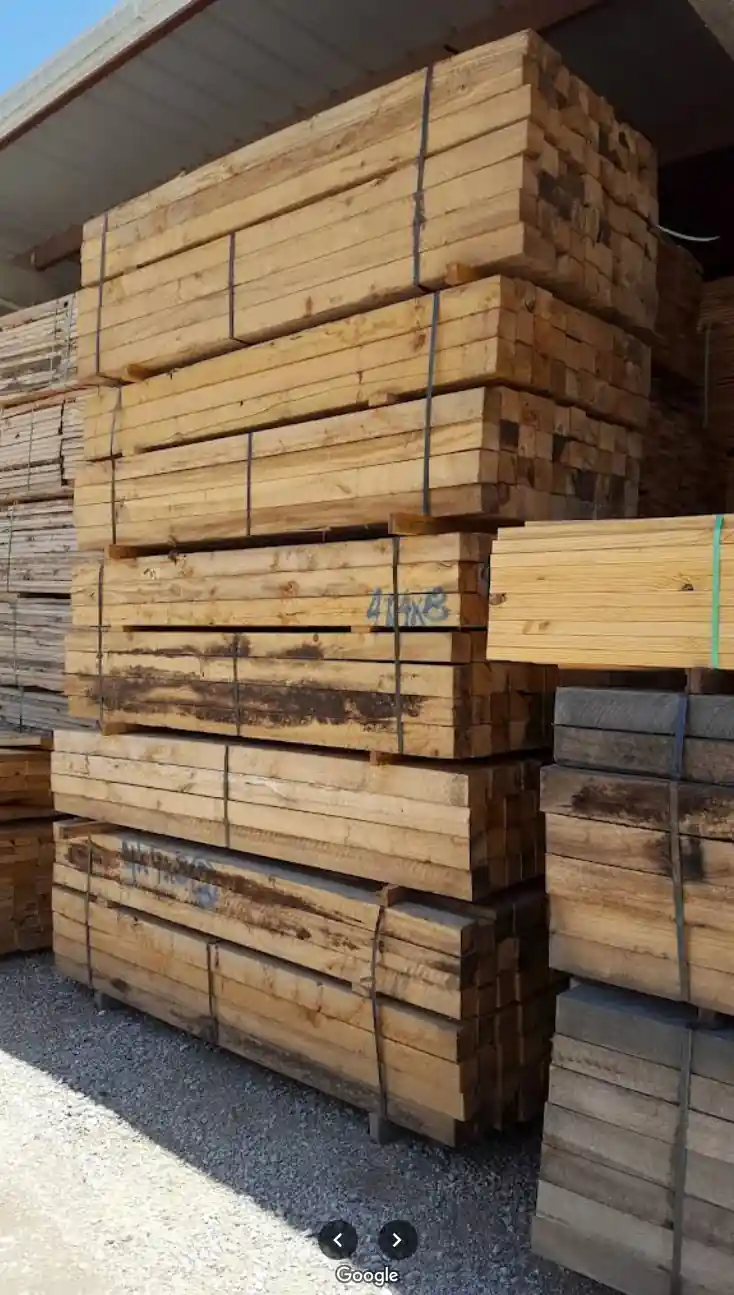 Industrial lumber yard with stacked wood